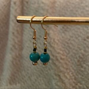 Blue beaded dangle earrings with gold wires
